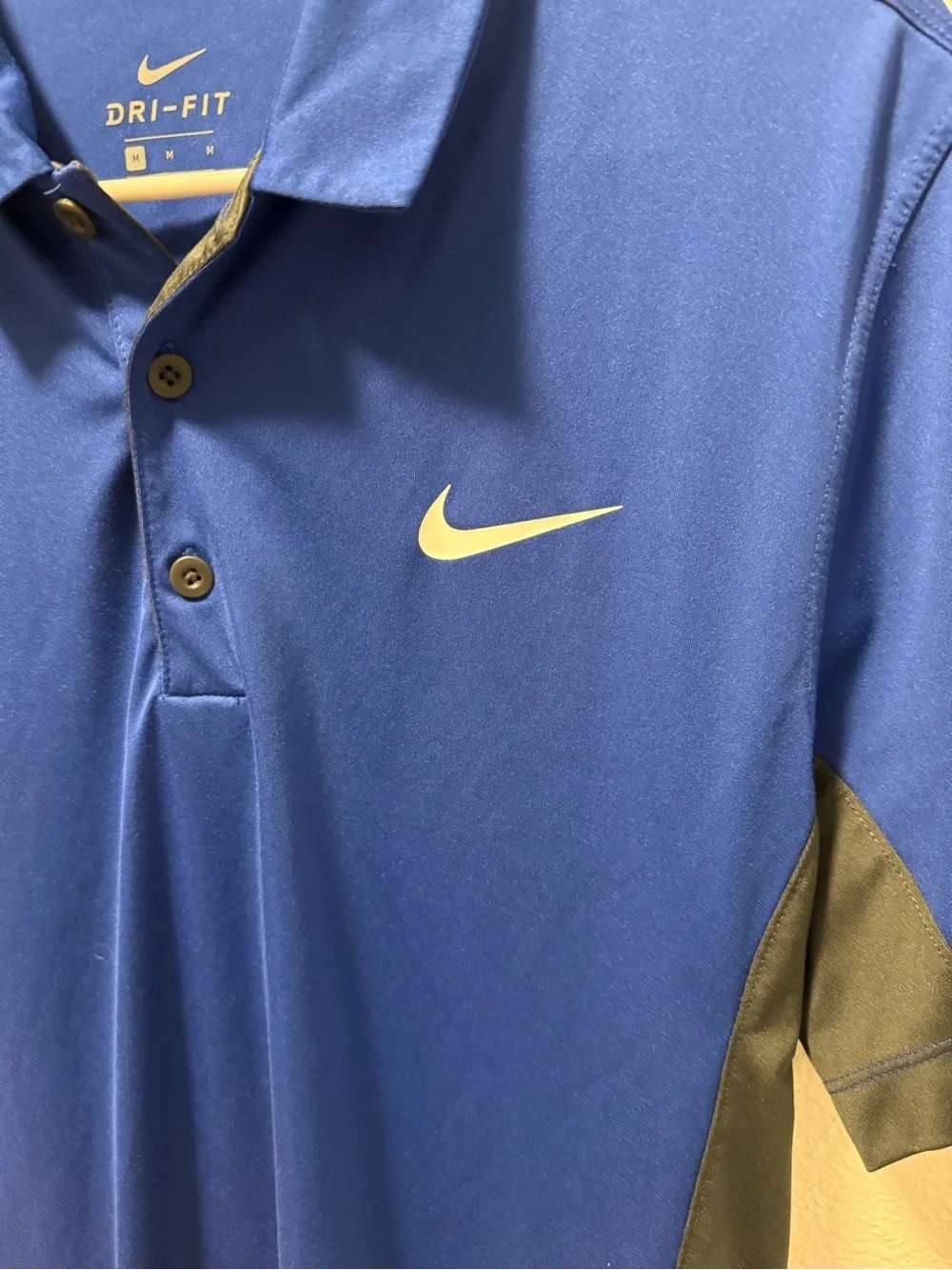 Nike Dri-Fit Blue Polo with Black Side Panels and Accent Trim. Men’s Size Medium